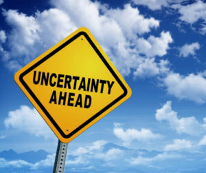 Uncertainty ahead sign representing triggers for headaches and migraines